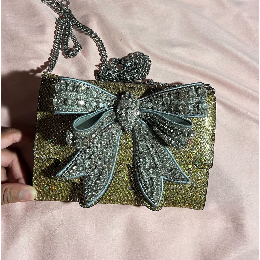 Gold / silver bow Kurt Geiger purse.